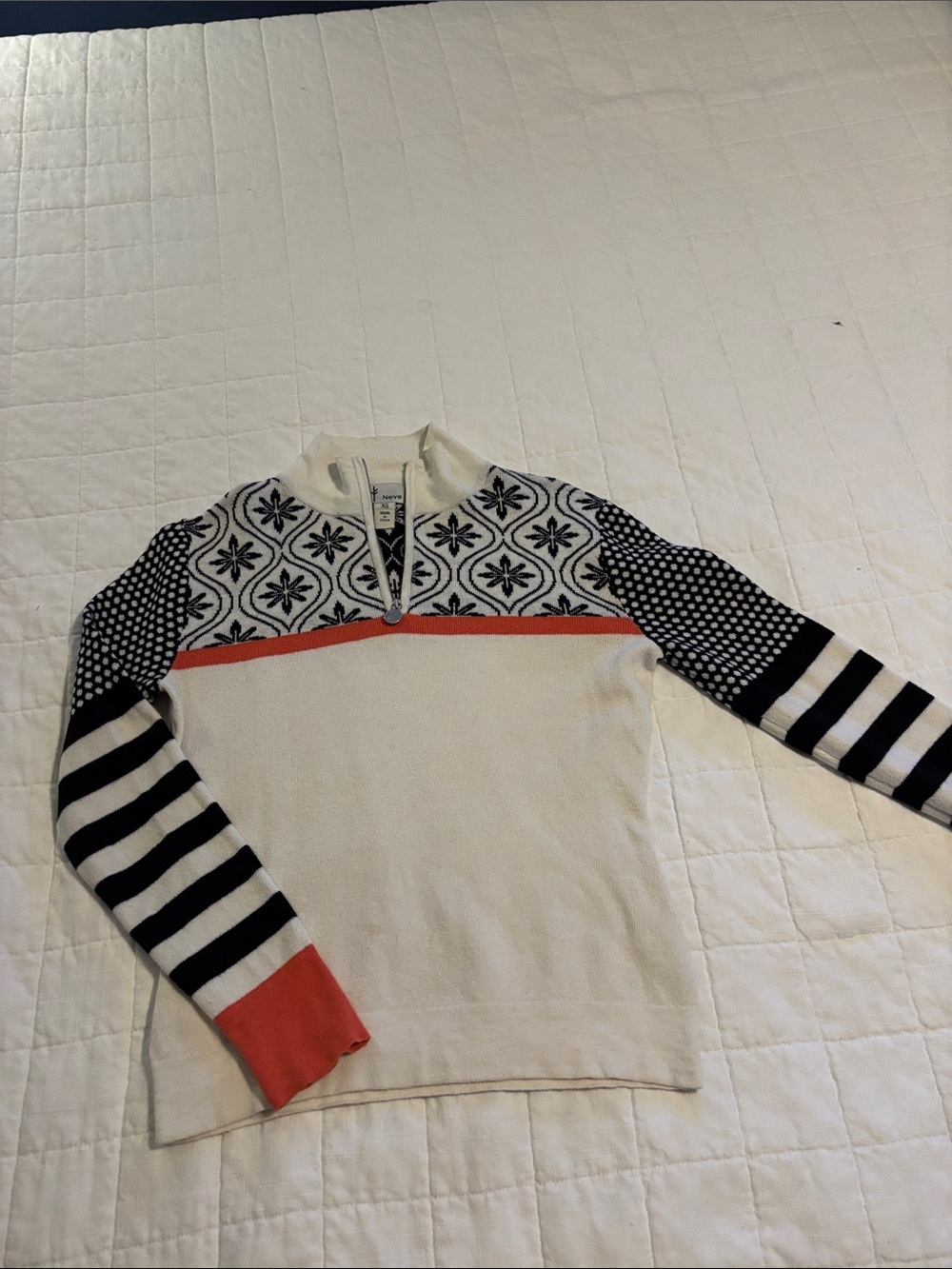 Cream Quarter-Zip Sweater with Black Pattern and Coral Trim